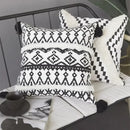 Geometric tufted black & white cushion cover living room tassel decor by Decorbites