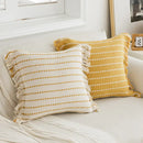 Geometric tufted yellow cushion cover with crochet tassels living room by Decorbites