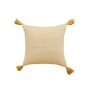 Geometric tufted yellow cushion cover with crochet tassels living room by Decorbites