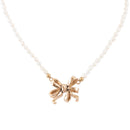 Gifted Freshwater White Pearl Golden Bow Pendant Necklace