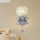 GobekUsa Globe Cutout Metal Shade Crystal Wall Sconce in Gold with Dropped Crystal Ball Accent