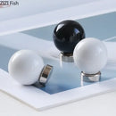 Glossy black & white ceramic wall hook clothing rack bedroom by Decorbites