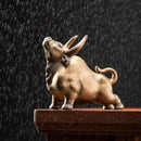 Glossy red ceramic bull figurine office decor animal statue by Decorbites
