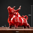 Glossy red ceramic bull figurine office decor animal statue by Decorbites