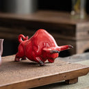 Glossy red ceramic bull figurine office decor animal statue by Decorbites