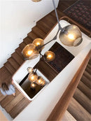 GobekUsa Glass Branching Staircase Chandelier with LED Multi-Color Lampshades.