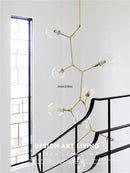 GobekUsa Glass Branching Staircase Chandelier with LED Multi-Color Lampshades.