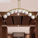 GobekUsa Gold Island Pendant with Clear/White Shade and Curvy Design - Perfect for Modern Kitchens (3/5/7 Lights)