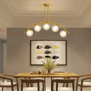 GobekUsa Gold Island Pendant with Clear/White Shade and Curvy Design - Perfect for Modern Kitchens (3/5/7 Lights)