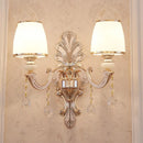 GobekUsa Gold Scrolled Arm Wall Mount Lamp with Crystal Accent - Elegant Metallic Wall Sconce
