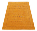 Gold Tribal Medallion Hand Loomed Wool Area Rug with Accents by The Rug Decor
