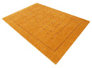 Gold Tribal Medallion Hand Loomed Wool Area Rug with Accents by The Rug Decor