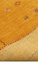 Gold Tribal Medallion Hand Loomed Wool Area Rug with Accents by The Rug Decor