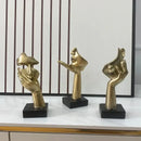 Golden abstract mask statue for home office decor by Decorbites