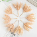 Golden artificial autumn branches set living room decor by Decorbites