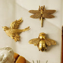 Golden bird and butterfly resin wall decor for living room by Decorbites