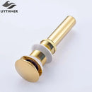 Golden brass vintage bathroom sink pop up drain by Decorbites