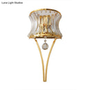 GobekUsa Golden Curved Metal Wall Sconce with Clear Crystal Prism