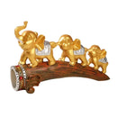 Golden elephant resin ornament living room figurine on log base by Decorbites