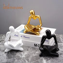 Golden glossy abstract thinker resin figurine office decor by Decorbites