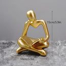 Golden glossy abstract thinker resin figurine office decor by Decorbites