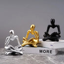 Golden glossy abstract thinker resin figurine office decor by Decorbites
