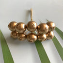 Golden metallic berry stamen green plant foliage for living room decor by Decorbites