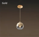 Gradient glass ball chandelier set for dining room by Decorbites