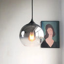 Gradient glass ball chandelier set for dining room by Decorbites