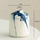 Graffiti ceramic vase blue & white splatter living room decor by Decorbites