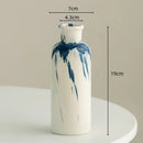 Graffiti ceramic vase blue & white splatter living room decor by Decorbites