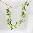Green and white artificial flowers garden wedding arch decor by Decorbites