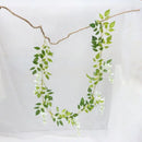 Green and white artificial flowers garden wedding arch decor by Decorbites