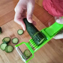 Green plastic 2-in-1 peeler slicer – kitchen carrot round cutter by Decorbites