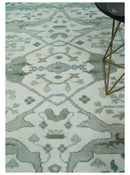 Hand Knotted Oriental Oushak Wool Area Rug - Ivory and Teal Tones by The Rug Decor