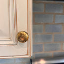 Round "Capri" Antique Brass Cabinet Knob