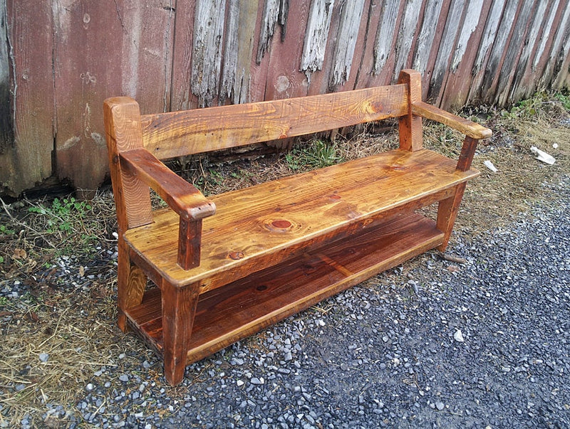 Wood dining bench with back and armrests. Reclaimed wood bench