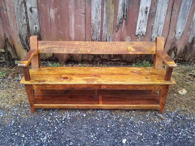 Wood dining bench with back and armrests. Reclaimed wood bench