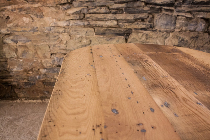 Oval wood dining table with antique mid century design. Oval kitchen table made of reclaimed wood