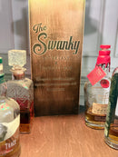 Motorized Pop Up Bourbon Barrel Cabinet.  Remote control & LED lighting.  Works with Alexa and Google Home. Custom engraving available.