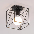 Industrial black geometric cage flush mount ceiling light bedroom by Decorbites