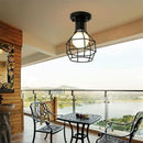 Industrial black geometric cage flush mount ceiling light bedroom by Decorbites