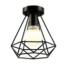 Industrial black geometric cage flush mount ceiling light bedroom by Decorbites