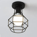 Industrial black geometric cage flush mount ceiling light bedroom by Decorbites