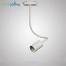 Industrial black gooseneck track lighting – clothing store fixture by Decorbites