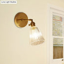 GobekUsa Clear Textured Glass Wall Sconce with Brass Accents for Industrial Dining Room Lighting