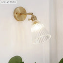 GobekUsa Clear Textured Glass Wall Sconce with Brass Accents for Industrial Dining Room Lighting