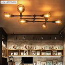GobekUsa Industrial Intersecting Piping Ceiling Light - Iron Semi Flush Mounted with Cage Guard, Brass Finish (4/5/8 Heads)