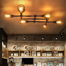 GobekUsa Industrial Intersecting Piping Ceiling Light - Iron Semi Flush Mounted with Cage Guard, Brass Finish (4/5/8 Heads)