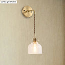 GobekUsa Industrial Brass Sconce with Clear Textured Glass Dome - One Light Lighting Fixture